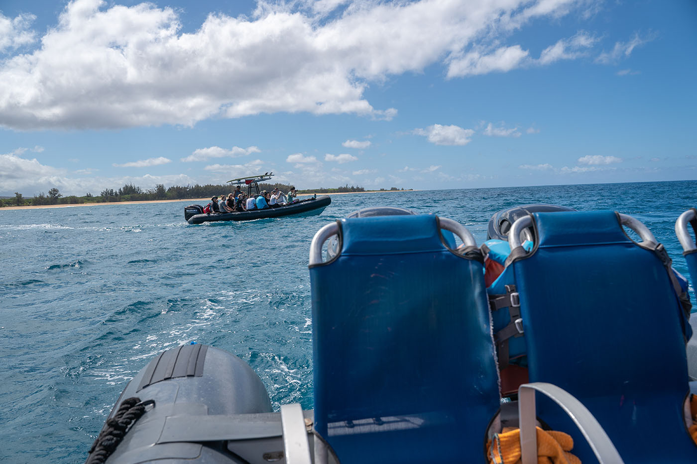 captain-andys-rhib-seats.jpg Blue perimeter seats inside a rigid inflatable tour boat off Kauai