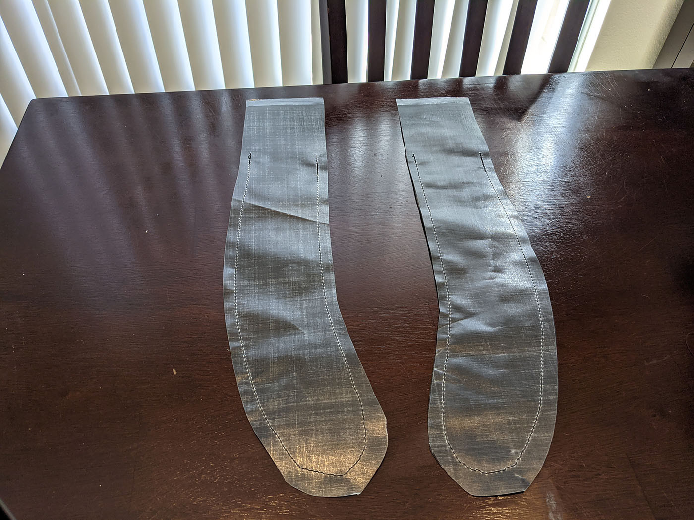 Pair of stitched Dyneema shoulder strap shells before padding