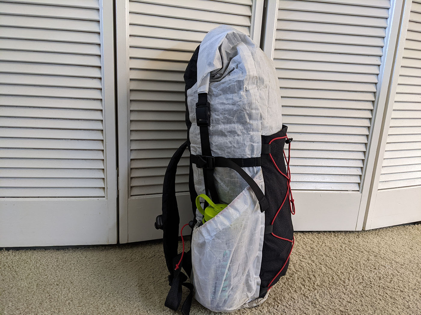 Side view of the finished white and black Dyneema backpack
