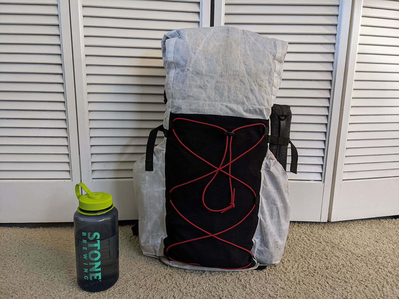 Front mesh pocket and red shock cord on the finished Dyneema backpack