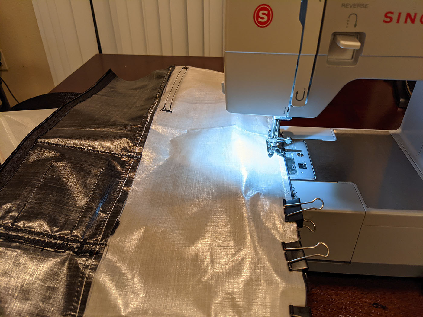 Sewing a white Dyneema body panel to the black back panel