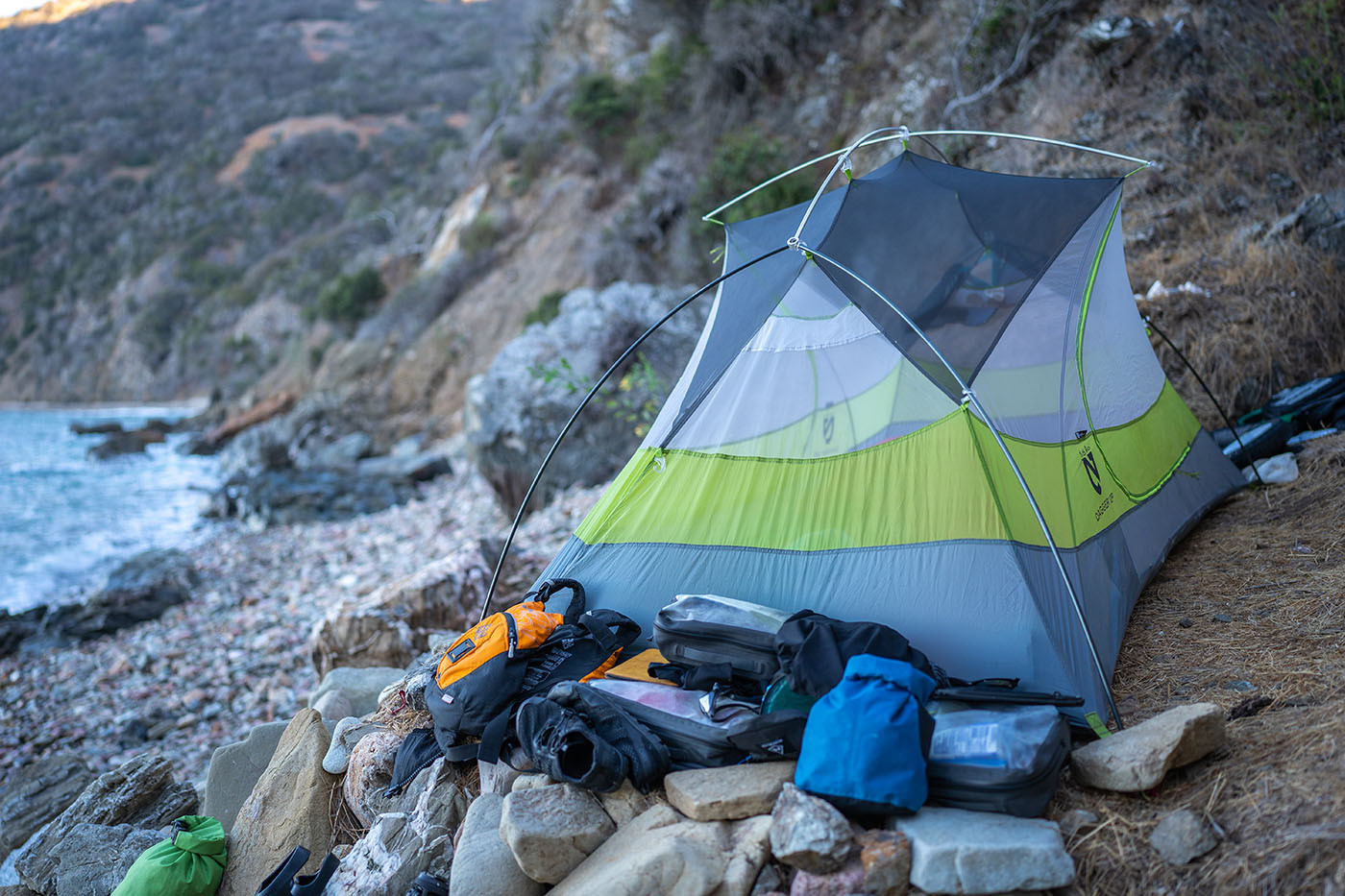 Tent and paddling gear set above the rocky shoreline at Italian Gardens 4